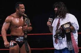 Cactus jack comes through the ring to even the odds vs. The Rock N Sock Connection Wikipedia