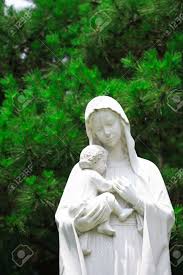 Jesus and mary look at each other with a smiling face.we can custom various mary holding baby jesus statue in any style and size as you want. Close Up Shot Of A White Statue Of Virgin Mary Holding Baby Jesus Stock Photo Picture And Royalty Free Image Image 83483356