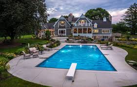 outdoor stone kitchen design with pool