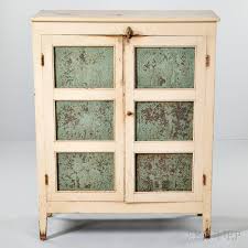 The screening is coming away a bit along the edges on the sides. Painted And Punched Tin Pie Safe 2838m 1429 Skinner Auctioneers