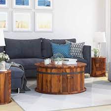 This arrangement leaves enough room for walking, and makes it easy for everyone to take a seat on the sofa's deep cushions. Friant Rustic Solid Wood Top Open Storage Round Coffee Table
