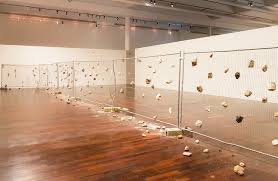 Untitled (couscous) (2009), floor sculpture, couscous, black acrylic. Kader Attia Mac Val Vitry Sur Seine Point De Vue Slash Paris