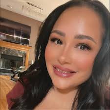 I don't know much about quinceanera's I'm white and her dad was Mexican  when do I start planning one, how much does it usually cost etc., we're not  catholic. All I know