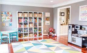 Neutral basement features a sectional and wood accents. Basement Playroom Tags Project Nursery