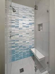 Finish the design by using basic, white subway tiles to frame the focal wall. 44 Modern Shower Tile Ideas And Designs 2021 Edition