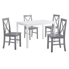 A casual style gives farmhouse dining tables a lot of appeal in a dining room. 5 Piece Solid Wood Farmhouse Dining Set White Grey By Walker Edison