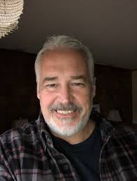 How to edit a picture to change the backdrop to a cigar lounge?