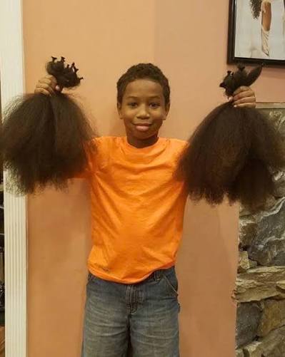 A 12 year old boy spent years growing out his natural hair just to cut it all  off and donate 17 inches to be made into wigs for children with cancer. That