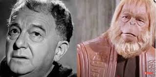 Late to the party here! Dr. Zaius = Samantha's dad, Maurice!! (Maurice  Evans)