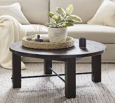 If you have a material of choice, look through a wide range of tables in different materials like marble, glass, wood, and metal. Benchwright 42 Round Coffee Table Pottery Barn