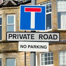 What does a no through road sign mean?