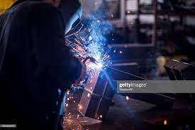 Welder At Work In Workshop Welders Workshop Stock Photos
