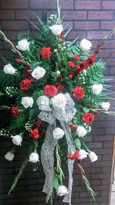 Red and white filler flowers. Red And White Standing Spray In Olive Branch Ms The Yellow Rose Florist Llc