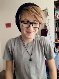 This mohawk is one of the few androgynous haircuts for curly hair that can get the most out of the texture. Pin On Style