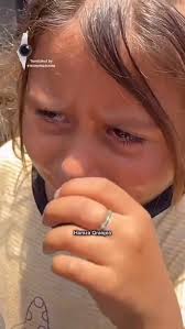 A little girl cries bitterly in front of the food line amid an ongoing food  crisis…
