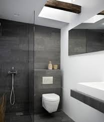 The dark gray floor creates a striking contrast with the other features. 20 Trendy Gray Bathroom Interiors In Contemporary Style