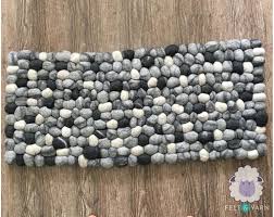 Maybe you would like to learn more about one of these? Black Grey And White Pebble Rug For Home Felt Yarn