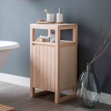 This white wood cabinet has a vary practical storage section and will look great in your bathroom. Tall Wooden Bathroom Cabinet Southbourne