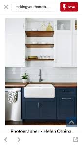 Pretty Colour Combo For A Small Kitchen Navy Blue With White Upper Cabinets Floating Shelves And Subway Tile Subway Kitchen Renovation Kitchen Home Kitchens