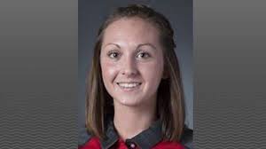 UofL runner helps carry another across finish line