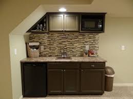 basement wet bar under stairs used