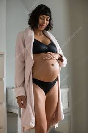 Women in bra and panties. Pregnant Woman In Bra And Panties Touching Stomach Stock Image F030 0575 Science Photo Library