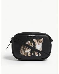 Cats are common pets that can follow the player. Balenciaga Cat Crossbody Bag Leather Black Lyst