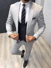 Slim fit through the shoulders, chest and waist with higher armholes and slimmer sleeves. Apollo Light Gray Slim Fit Suit Fashion Suits For Men Grey Slim Fit Suit Dress Suits For Men