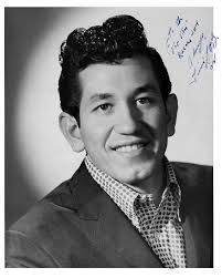 This picture of Dallas' Trini Lopez was signed when Trini dropped by Top  Ten Records at 338 W. Jefferson in about late 1959. This was when Trini was  hanging out at Sivils'