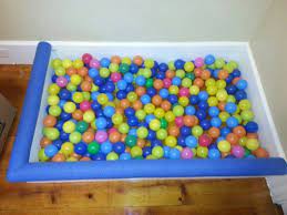 Indoor Ball Pit We Used 2x8s Same Size As The Baseboards 6 Brackets 12 Screws Paint And A Dollar Store Noodle For T Ball Pit Kids Ball Pit Baby Ball Pit