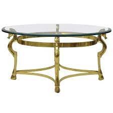 Also set sale alerts and shop exclusive offers only on shopstyle. Vintage Italian Hollywood Regency Brass Seahorse Small Oval Glass Coffee Table At 1stdibs
