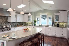 Last week, we looked at kitchens with windows facing east for early morning sun. The Cathedral Feel Of The Kitchen S Vaulted Ceiling Is Enhanced By Pendant Lights Which Draw The Eye Up Ligh Kitchen Soffit Spacious Kitchens Skylight Kitchen