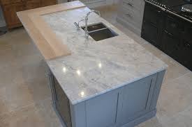 Cherry and mahogany cabinets bring out. Moon White Quartzite Worktops Algarve Granite Northampton Craftsmen In Natural Stone