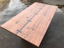 This section features a range of amazing bone inlay dining tables. Hand Made Modern Walnut Dining Table With Metal Inlay By Don Yacovella Custommade Com