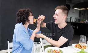 Here's a step by step expert guide to eating pussy. Boyfriend Feeding Girlfriend People Pasta Stock Photo 126873822