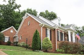View of front yard landscape. Our Brick House Exterior Makeover White Trim Black Shutters