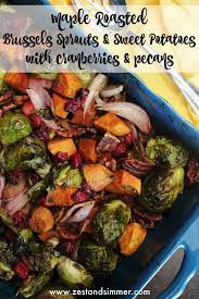 Maple Roasted Brussels Sprouts And Sweet Potatoes With Cranberries And Brussel Sprouts And Sweet Potato Recipe Sprouting Sweet Potatoes Roasted Brussel Sprouts