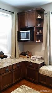 A Microwave Wall Cabinet Paired With A Shelf End Wall Cabinet In The Style Of Colonial Maple Pecan Kitchen Wall Cabinets Cabinet Wall Cabinet