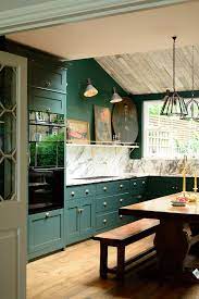 In house beautiful's kitchen of the year, designer martyn bullard. Deep Dark Green Cabinets And Walls Original Wooden Floorboards Brass Hardware And Lots Of Marble In Devol S Peck Home Kitchens Kitchen Design Kitchen Remodel