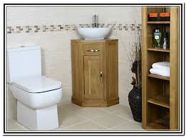 Bathroom corner cabinets also look great when paired with a small corner basin or vanity unit, effectively finding that solution to a futile area of your bathroom. Wood Corner Bathroom Vanity Belezaa Decorations From Creative Corner Bathroom Vanity In Small Area Pictures