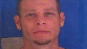 Suspect wanted for running stolen car into his girlfriend