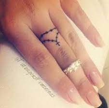 56 Impossibly Pretty And Understated Tattoos Every Girl Will Fall In Love With Tiny Finger Tattoos Tattoos Finger Tattoo For Women