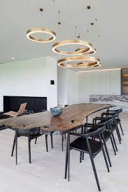 While it's helpful to have a starting point, be sure to eyeball how you want a chandelier or pendant to look in your space. Dining Room Lighting Ideas Use Multiple Fixtures Over The Table For A Greater Impact