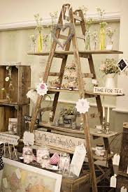 Very Creative Little Set Up Here All You Need Is A Ladder And Some Wood And You Can Instantly Crea Vintage Wedding Decorations Flower Shop Wedding Decorations