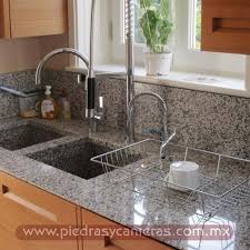 Las encimeras de granito tienen muchas ventajas en las cocinas, y también algunas desventajas. Granito Blanco Acapulco Granito Natural Cubiertas Granito Para Cocina