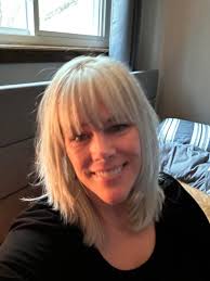 People ask me how I went from color to silver. I cut it short and let it  grow out. It took a year. It's empowering! I love it.