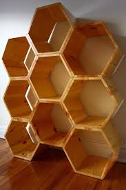 Also, josh has this secret dream of keeping bees, which inspired the shape of the shelves. Shelving Unit In Clear Non Toxic Finish Honeycomb Shelf Etsy Unique Bookcase Retail Shelving Honeycomb Shelves