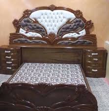 لعمل الغرف التواصي وكناتير وبوفيات وبواب معرض ومعمل العراق لعمل غرف النوم وجميع أعمال النجاره