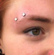 Fresh Horizontal Brow Surface Piercing With 4mm Titanium Tops And A Titanium Surface Staple By Mol Eyebrow Piercing Horizontal Eyebrow Piercing Face Piercings