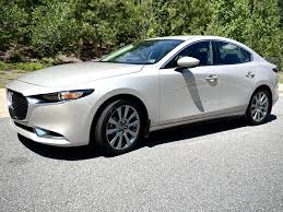 Image result for Sunlight Silver 2007 Mazda3